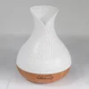 palma-aroma-diffuser-400ml-01-hero Palma aroma diffuser met witte craquelékap en houtlook basis
