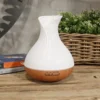 palma-aroma-diffuser-400ml-04-lifestyle Palma aroma diffuser op een houten tafel in een interieur