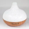 santorini-aroma-diffuser-400ml-01-hero Santorini aroma diffuser met ronde witte craquelékap en houtlook basis