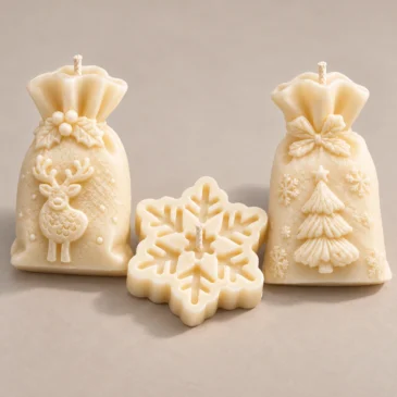 scentulp-wintertrio-03-detail Wintertrio van Scentulp: twee ivoorkleurige cadeauzakkaarsen en een sneeuwvlokkaars — detail van de handgemaakte kaarsen.